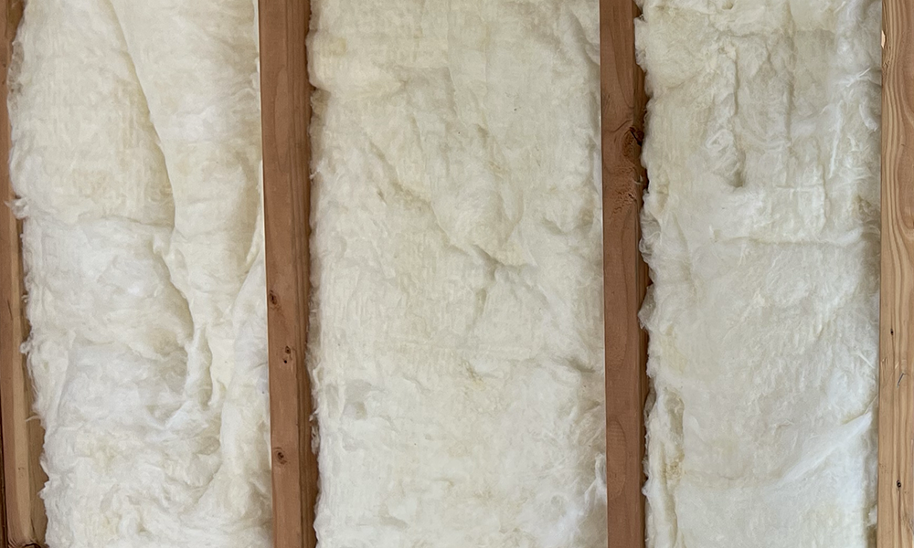 High-Quality Batt Insulation Installed in Wall for Energy Efficiency and Comfort
